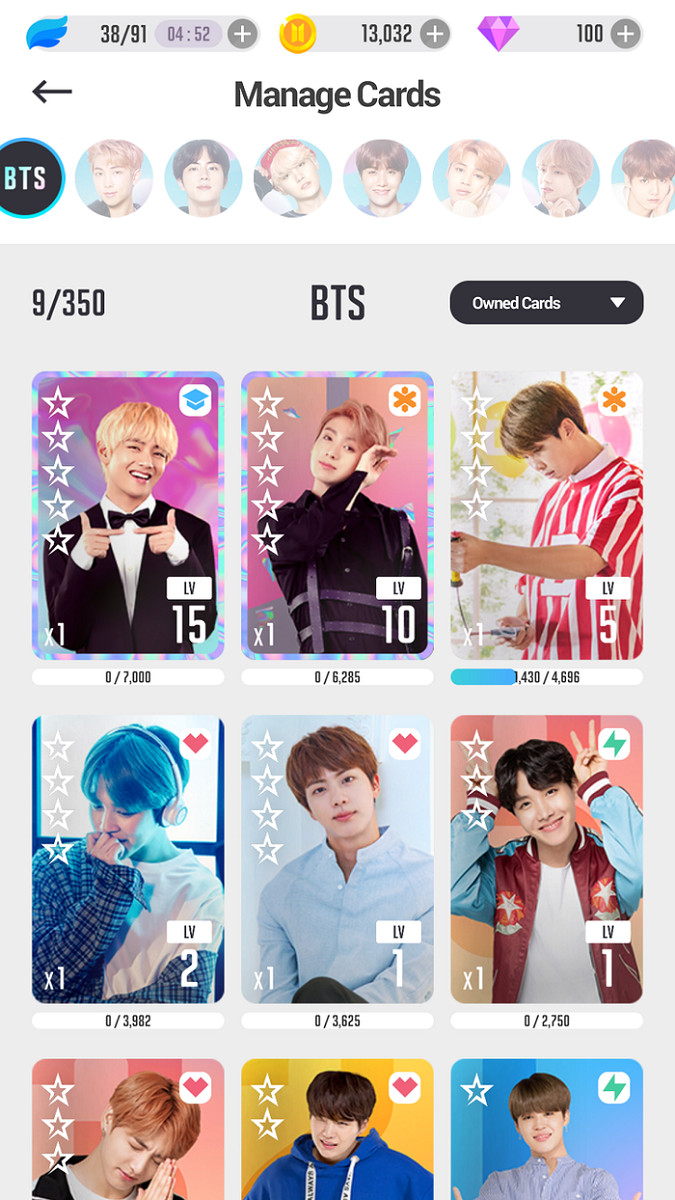 alt text: Hình ảnh giao diện game BTS World với các thành viên nhóm nhạc