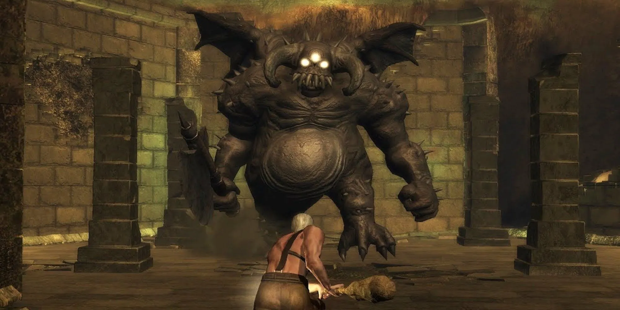Boss Vanguard trong Demon's Souls với cây rìu khổng lồ đang thực hiện một đòn tấn công mạnh mẽ