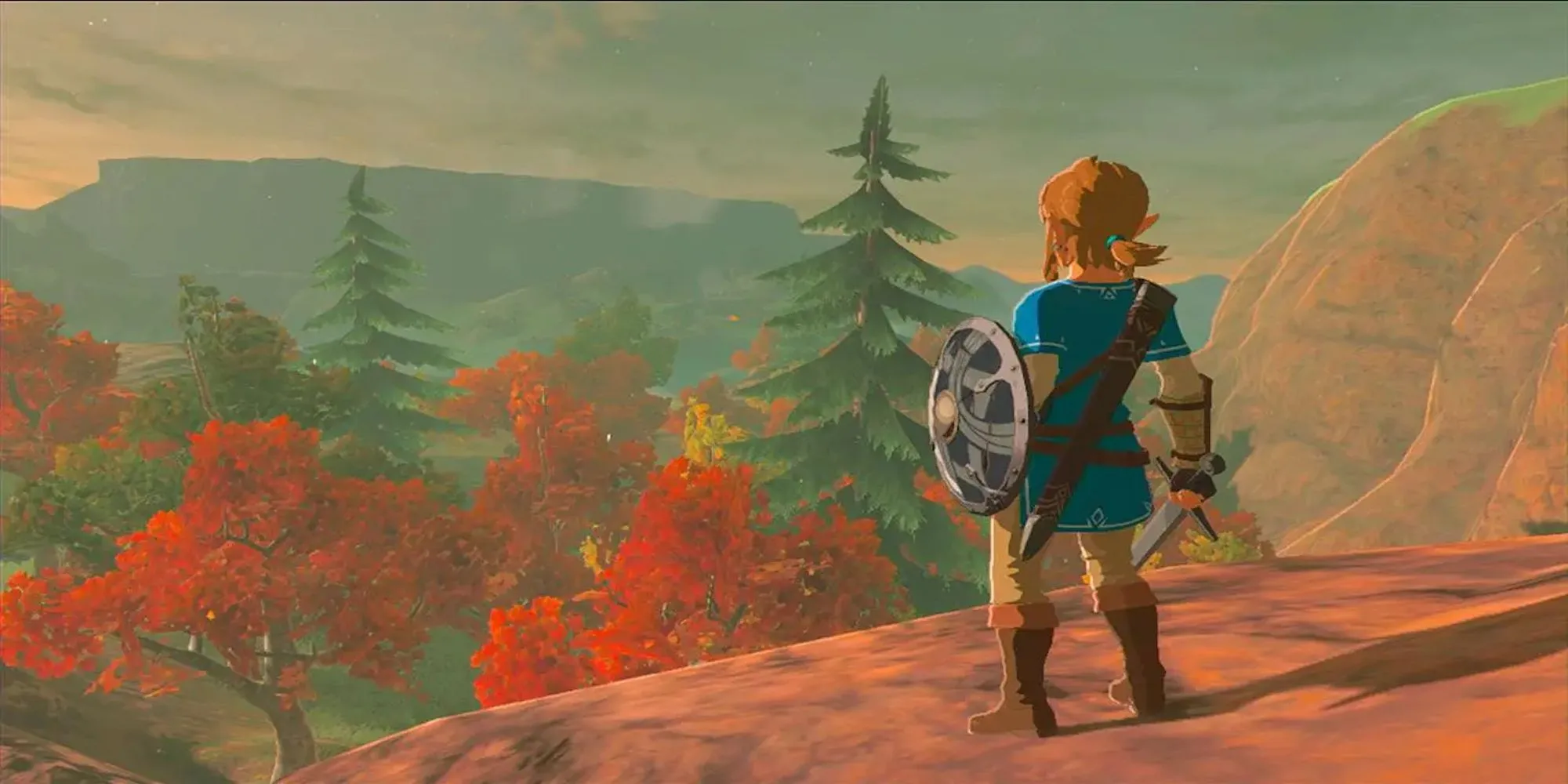 Link nhìn ra vách núi trong The Legend of Zelda: Breath of the Wild, phong cảnh rộng lớn và thơ mộng của Hyrule