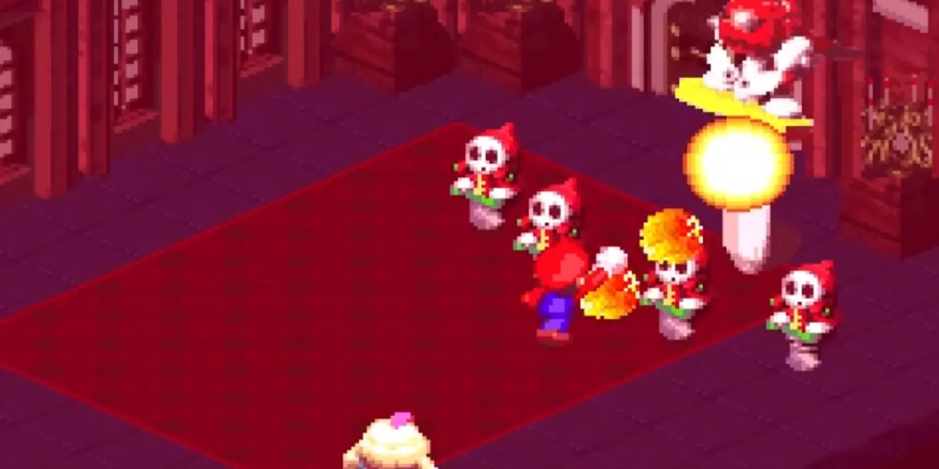 Mario sử dụng chiêu Fire Sphere tấn công Mack trong Super Mario RPG
