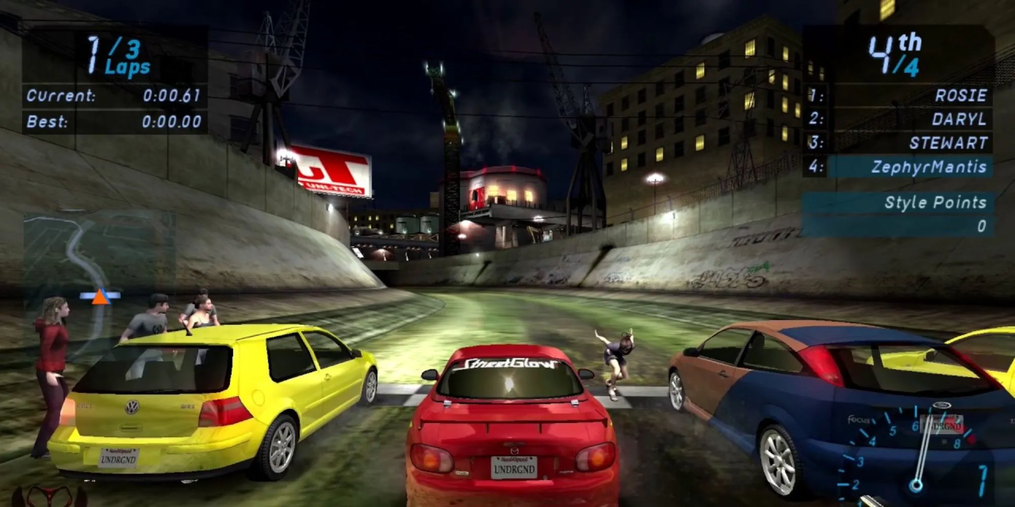 Một cuộc đua đêm trong Need For Speed: Underground trên PS2, nổi bật với ánh đèn neon và xe độ.