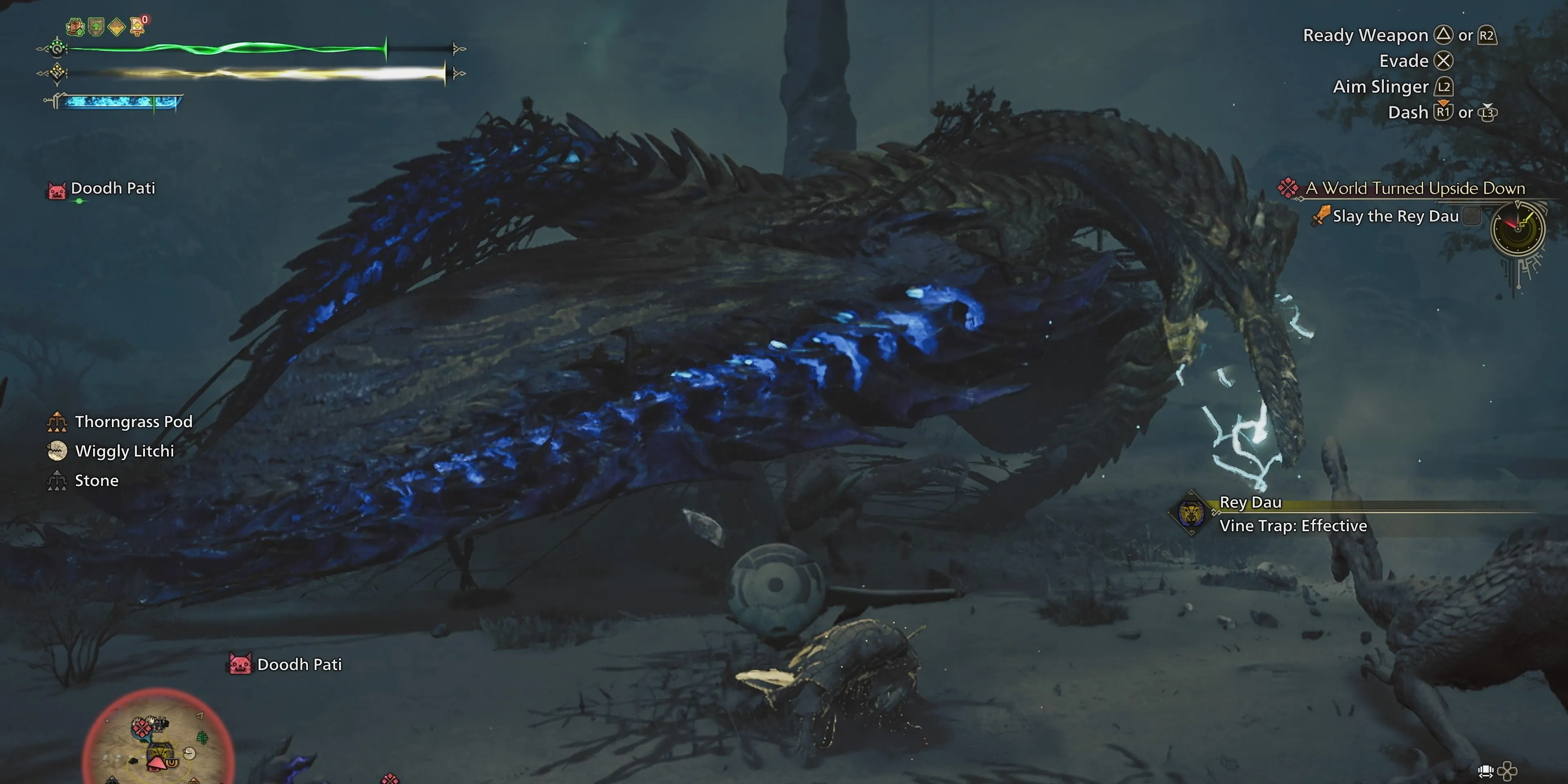 Thợ săn sử dụng bẫy dây leo để khống chế quái vật Rey Dau trong Monster Hunter Wilds