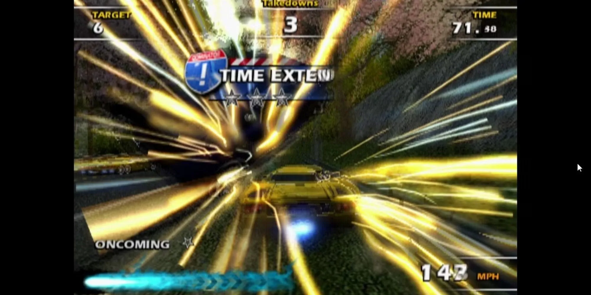 Xe đua màu vàng trong game Burnout Dominator đang thực hiện cú drift
