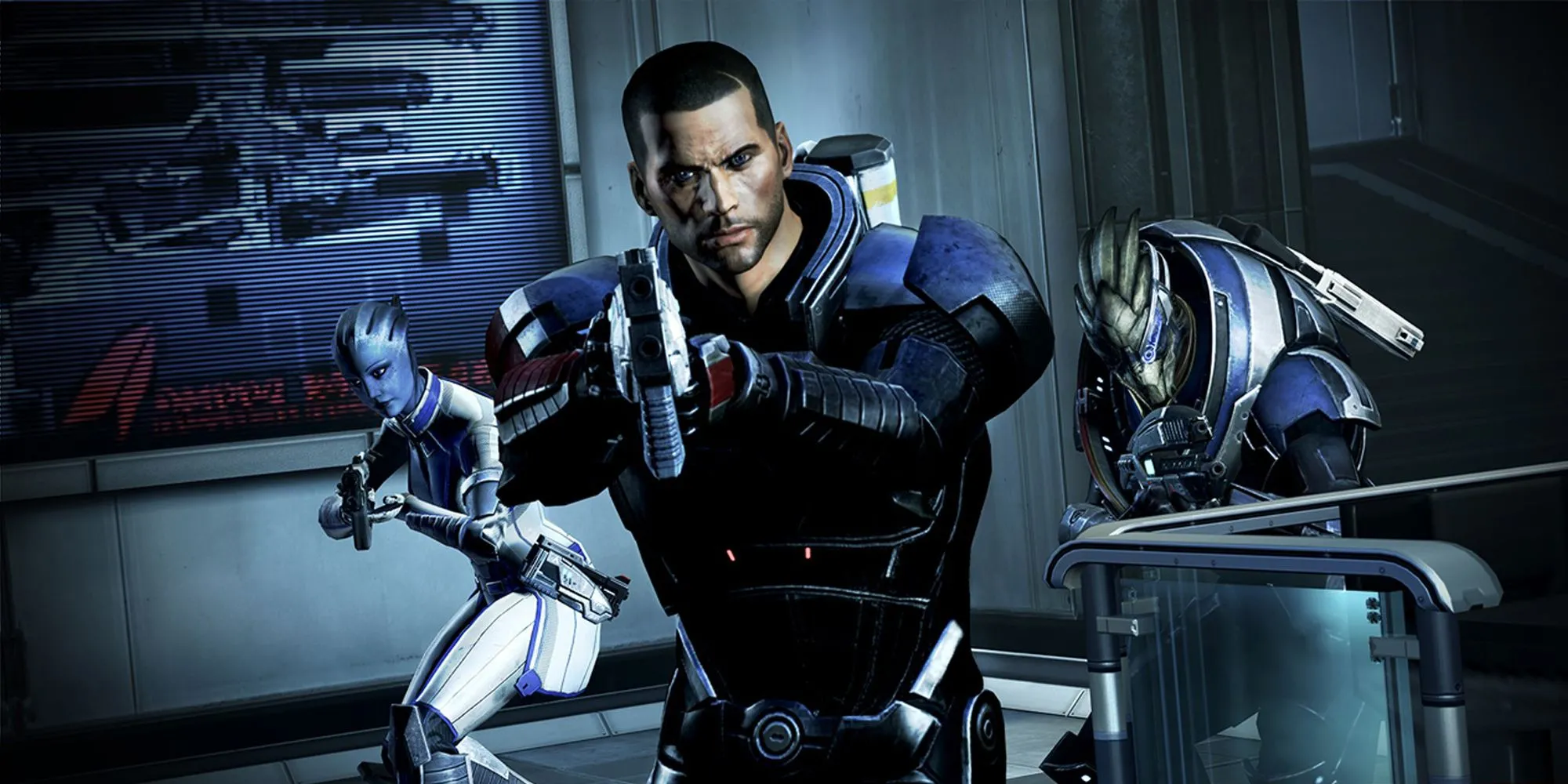 Alt: Hai thành viên tổ đội Liara và Garrus trong một cảnh game Mass Effect 3