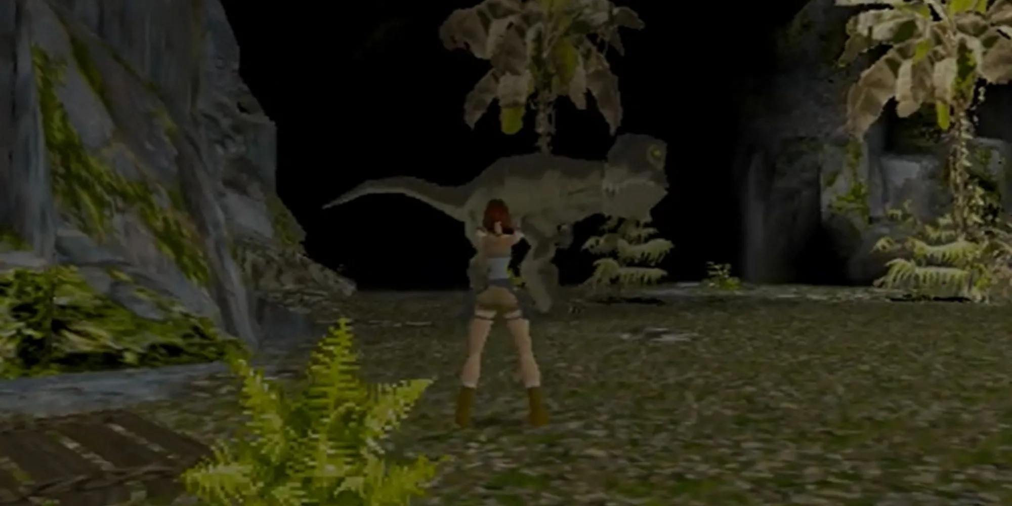 Lara Croft đối mặt với khủng long T-Rex trong game Tomb Raider đầu tiên