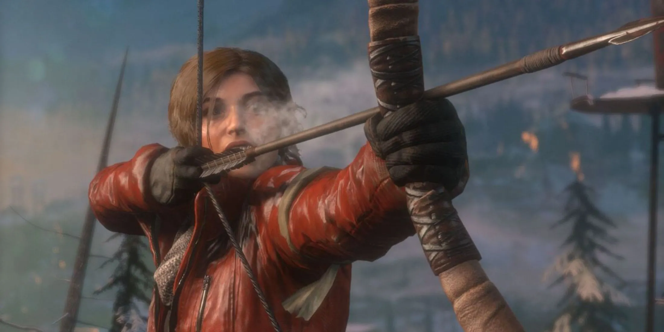 Lara Croft sẵn sàng chiến đấu trong môi trường tuyết phủ của Rise of the Tomb Raider